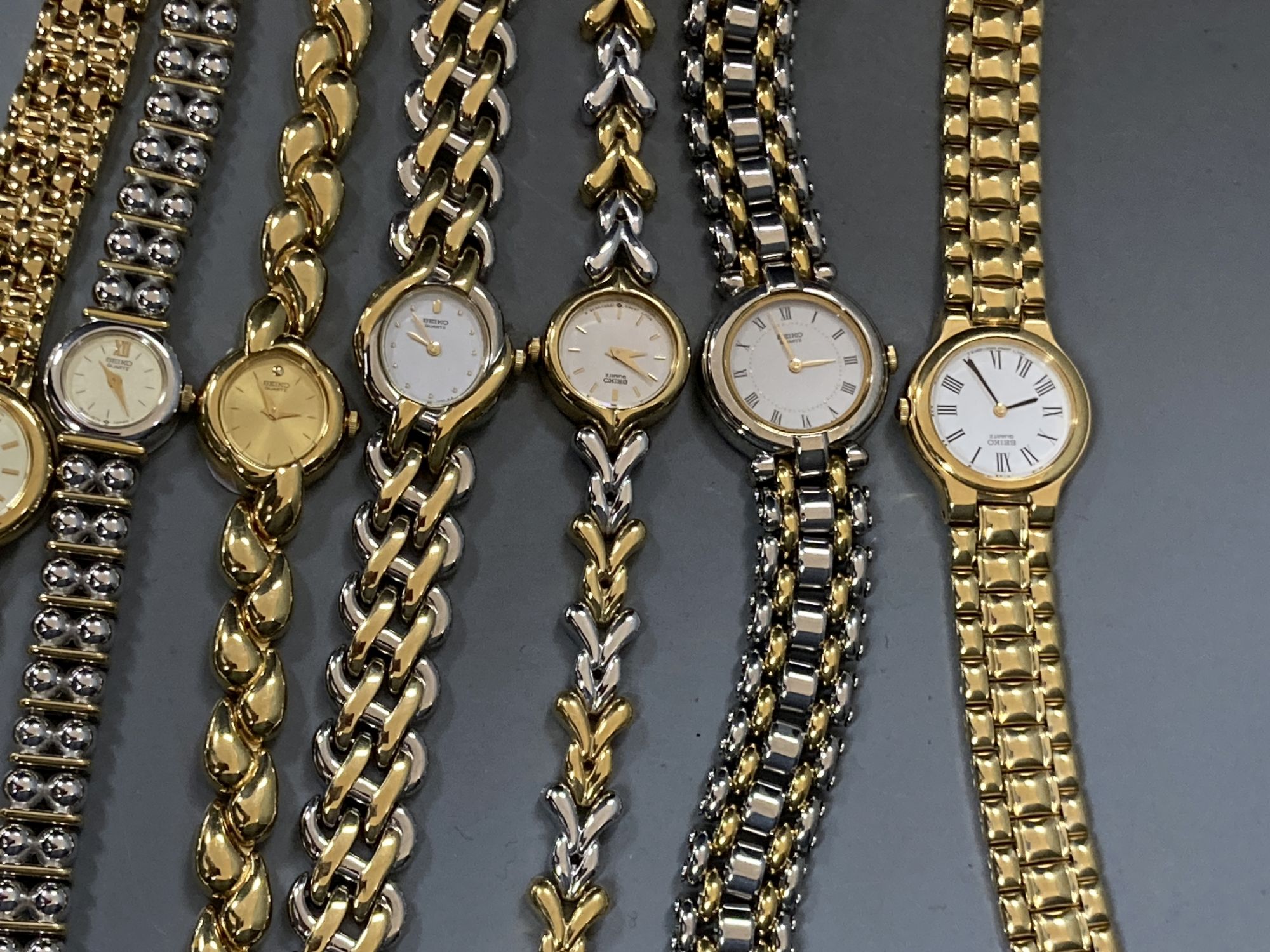 Three lady's 9ct gold wrist watches including two quartz, gross 29.9 grams and sixteen assorted lady's modern Seiko wrist watches.